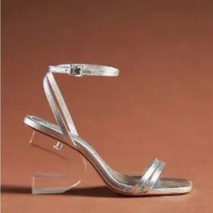 VICENZA SCULPTURAL HEELS | Anthropologie | Silver Acrylic Strappy High Heels